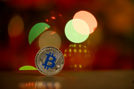 Digital currency physical metal bitcoin coin with abstract bokeh light. Cryptocurrency mining concept.の写真素材