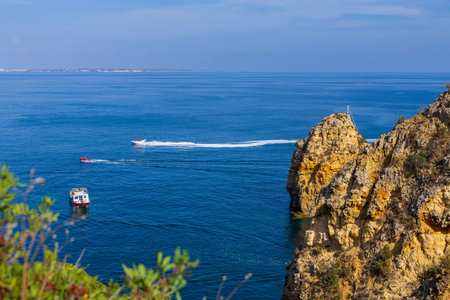 View of the Atlantic ocean and the cliffs on the Algarve Coast. Algarve Region, Portugalの写真素材