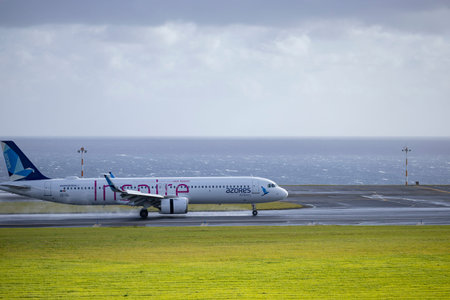 Ponta Delgada, Azores - 28.03.2024: Landing Airbus A321LR plane - Inspire - from Sata Azores Airlines in Joao Paulo II Airport in Ponta Delgada, Sao Miguel island, Azores.のeditorial素材