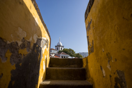 View of the tower of Church of Saint Mary the Great from the Fort of SÃ£o Tiago in Funchal. Madeira Island, Portugal.の写真素材