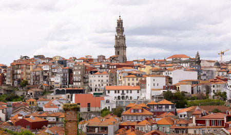 Porto cityscape with rooftops and the tower of Clerigos (Torre dos Clerigos) in background. Porto,...
