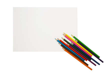 Colorful pencils ant the sheet of paperの写真素材