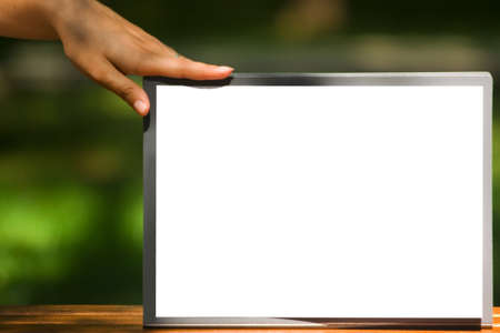 The clipboard with sheet of paperの写真素材