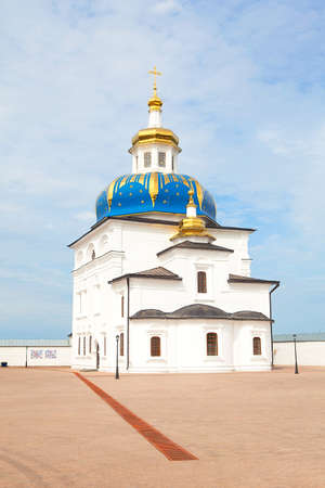 Orthodox cathedral with golden domes in a small townの写真素材