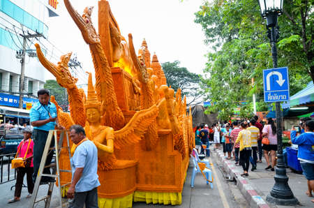 NAKHONRATCHASIMA, THAILAND - JURY 22, 2013: Candle Festival The annual Festival of Nakhon Ratchasima, Thailand.のeditorial素材