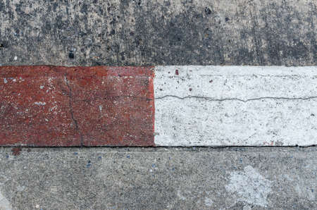 Red and white stripes represents prohibit parking on the street. Thailandの写真素材