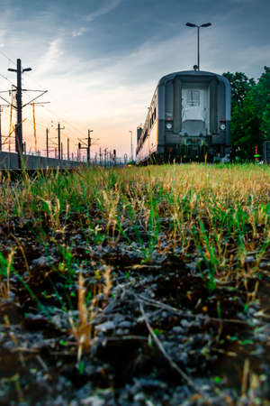 Vintage wagon in sunset mood with reflections of sunsetの写真素材
