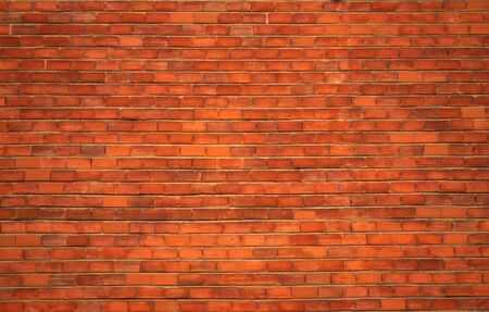 a red brick wall for backgrounds or wallpaper