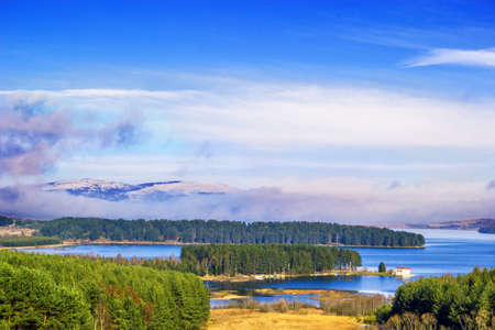 Autumn landscape of lake and treesの写真素材