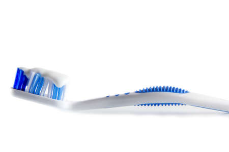 toothbrush with toothpaste in isolated white backgroundの写真素材