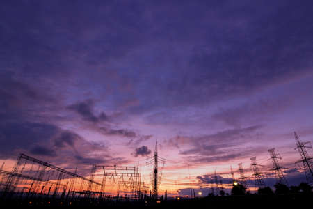 Electric power station at sunset with dramatic skyの写真素材