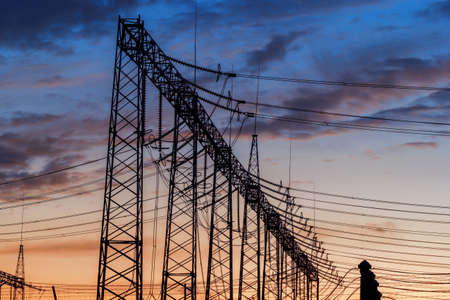Electric power station at sunset with dramatic skyの写真素材