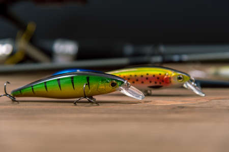 Fishing lures on a wooden backgroundの写真素材