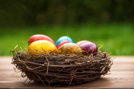 Colorful Easter eggs in a basket.