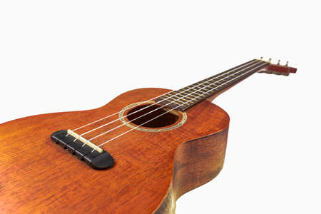 Brown ukulele, Hawaiian guitar, isolated on white background.の写真素材