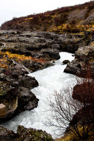 Landscape view of Hraunfossar, Lava Falls, with high river stream, Icelandの写真素材