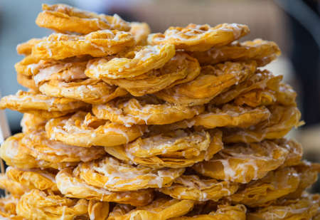 Stack of Crisp sweet bread, indian food, for sale in the food streetの写真素材