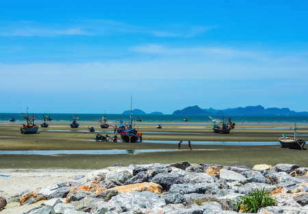 Prajubkirikrun, Thailand-July 18,2016: Wooden fishing boat on a sandy beach