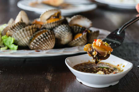 Scald scallops, cockles shell, at Thai restaurant.の写真素材