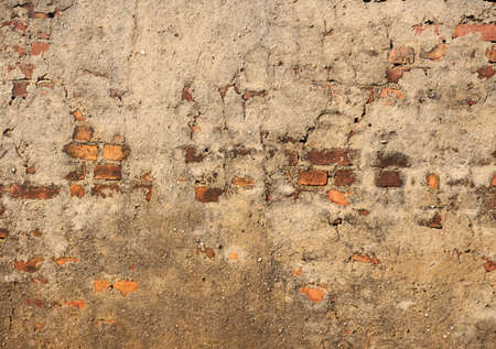 Old brick wall with cracks, for background texture.の写真素材
