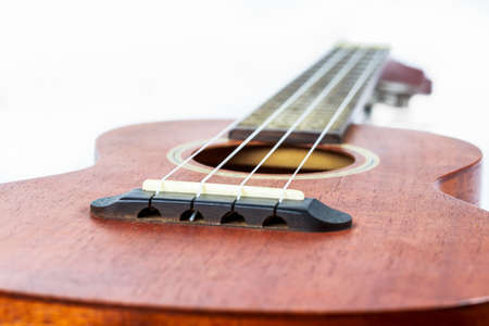 Brown ukulele, Hawaiian guitar, isolated on white background.の写真素材