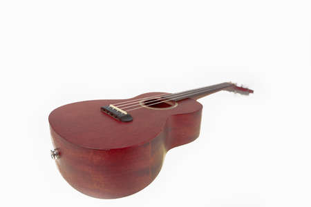 Brown ukulele, Hawaiian guitar, isolated on white background.の写真素材