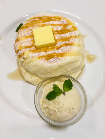Japanese cake, dessert, served with vanilla ice cream and mint on top.の写真素材