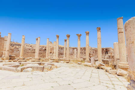 The ancient Roman city in Jerach, Jordan, the Cathedral, summer time, blue sky background.の写真素材