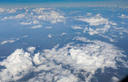 Beautiful natural cloudscape and sky, aerial view of Blue sky, cloudy of birdâs eye view from airplane window.の写真素材
