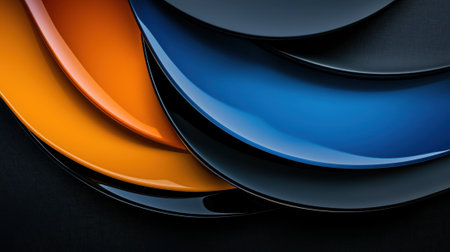 A black and orange and blue design with a blue line in the middle. The orange and blue plates are arranged in a way that creates a sense of movement and depthの素材