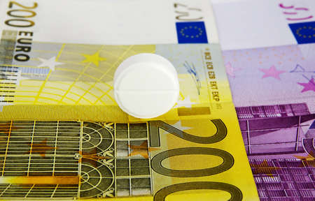 Pill on money