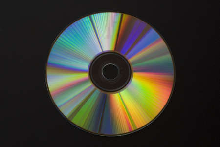 CD or DVD on blackの写真素材
