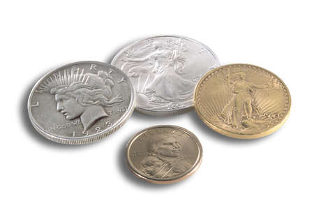 gold,silver and bronze american coins isolated on white with shadow の写真素材