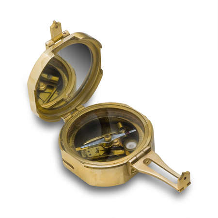 Antique brass compass on white with shadow の写真素材