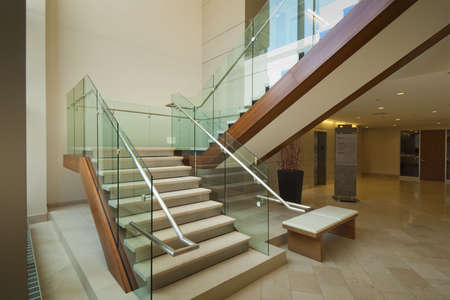 Staircase leading to 2nd floor in modern office buildingの写真素材