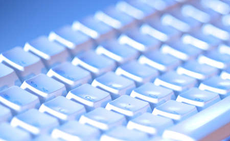 Computer keyboard close-up and back lit with limited depth of fieldの写真素材