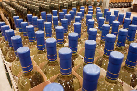 Wine bottles on display in a liquor storeの写真素材