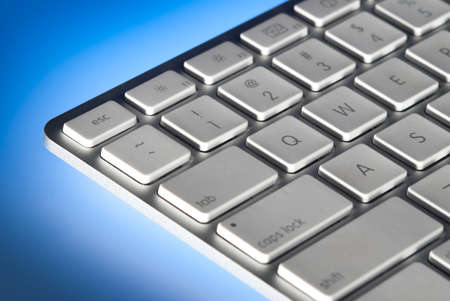 Computer keyboard close-up and back lit with limited depth of fieldの写真素材