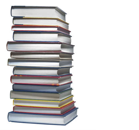 Stack of real books on white, isolated with room on right for textの写真素材
