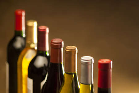 Wine bottles in a row with limited depth of fieldの写真素材