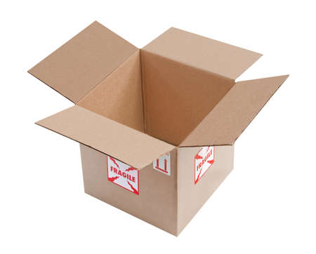 Open, empty corrugated cardboard box with fragile stickers on the outside, isolated 
