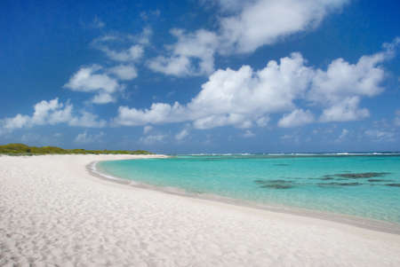 Turquoise water, sand and skyの写真素材
