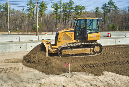 Bulldozer at work on road construction projectのeditorial素材