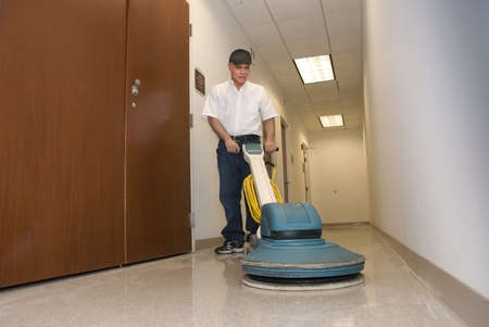 cleaner polishing office hallwayのeditorial素材