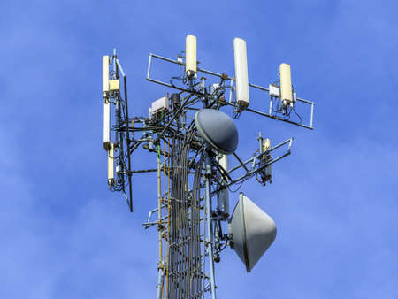 Telecommunications equipment - directional mobile phone antenna dishes. Wireless communication.の写真素材
