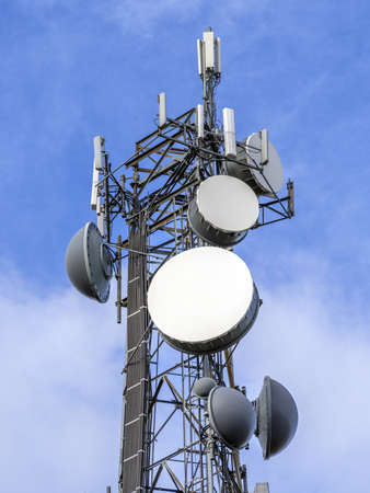 Telecommunications equipment - directional mobile phone antenna dishes. Wireless communication.の写真素材
