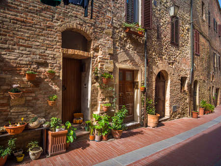 medieval 15th century street in a small village in Tuscanyの写真素材