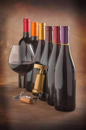 wine bottles, glass and corkscrewの写真素材