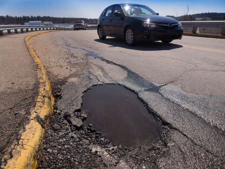 Pothole road damageの写真素材