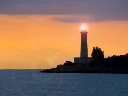 Lighthouse at sunset in Gytheio, Greeceの写真素材